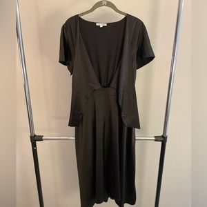 Black, silk dress with open tie detail in the front.